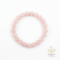 Rose Quartz 8mm crystal bracelet flat lay on white background with SoulUp Store logo