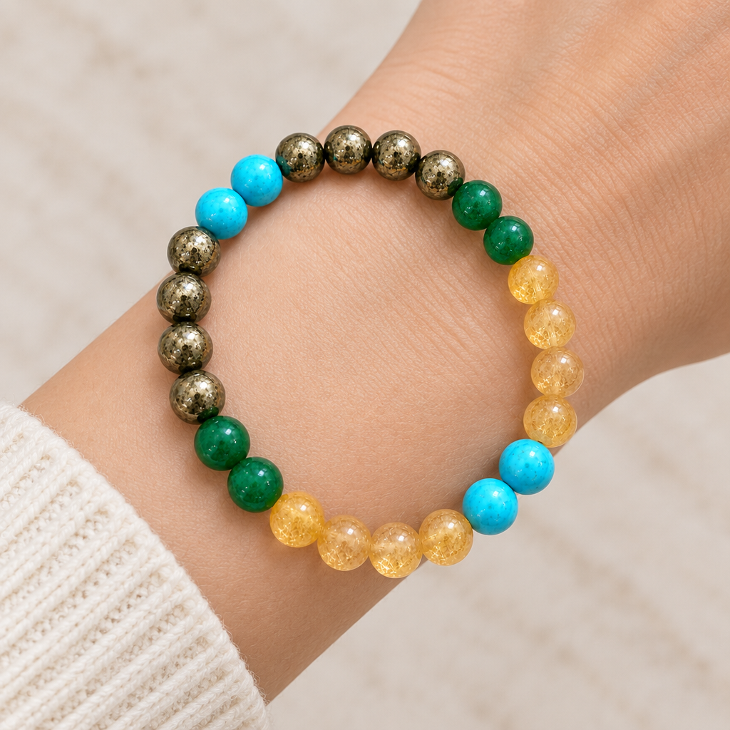 Single 24-bead Abundance & Prosperity Mixel Crystal Bracelet worn on wrist