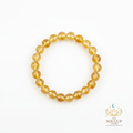 Citrine 8mm crystal bracelet flat lay on white background with SoulUp Store logo