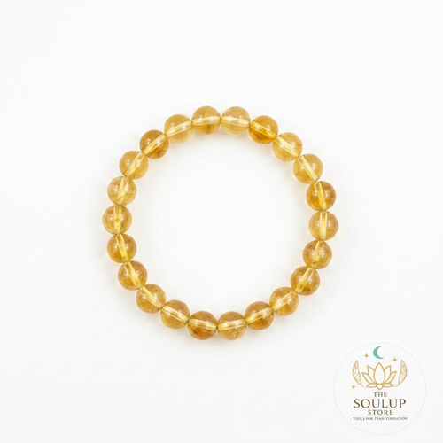 Citrine 8mm crystal bracelet flat lay on white background with SoulUp Store logo